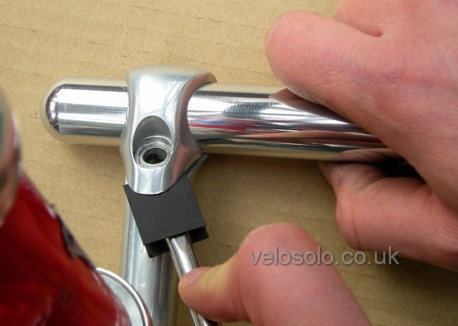 lever gently to open clamp slightly